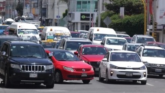 Avanza reforma para que deudores de fotomultas paguen tenencia